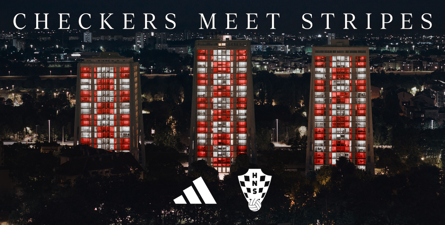 Croatia apartment buildings illuminated in the red-and-white checkerboard pattern to announce the adidas partnership