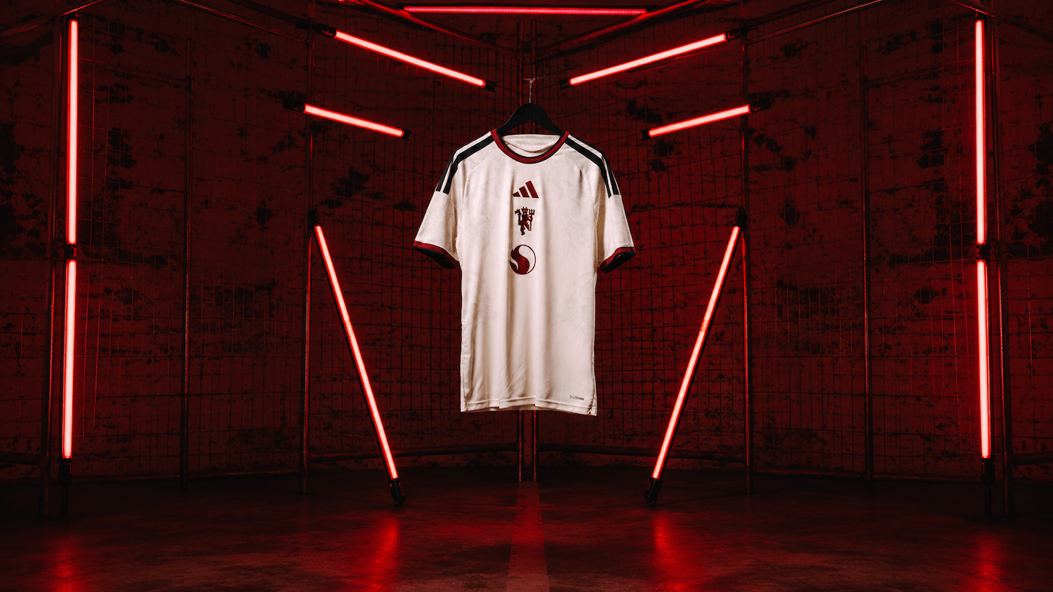 27 Third Jersey suspended in a red neon-lit room.