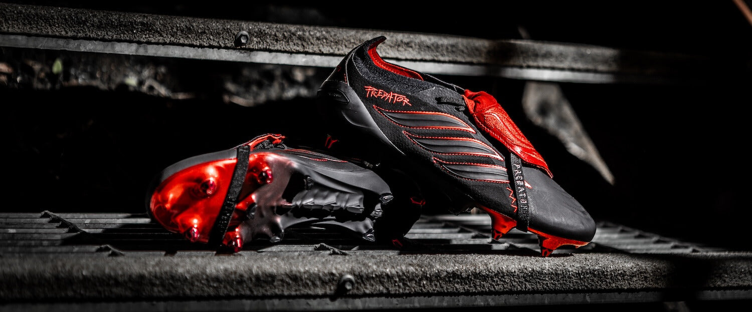 adidas Predator 1994 Leather-Tech football boots in black leather with red fold-over tongue and red soleplate