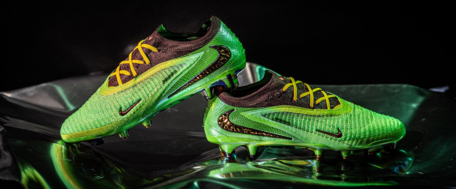 Nike x Travis Scott Phantom 6 Cactus Jack football boots in green with yellow laces and metallic detailing.