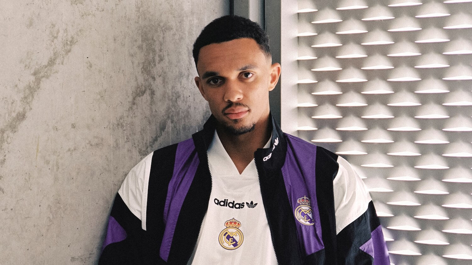 Trent Alexander-Arnold wearing the Real Madrid adidas EQT Culture Wear collection in black, white and purple