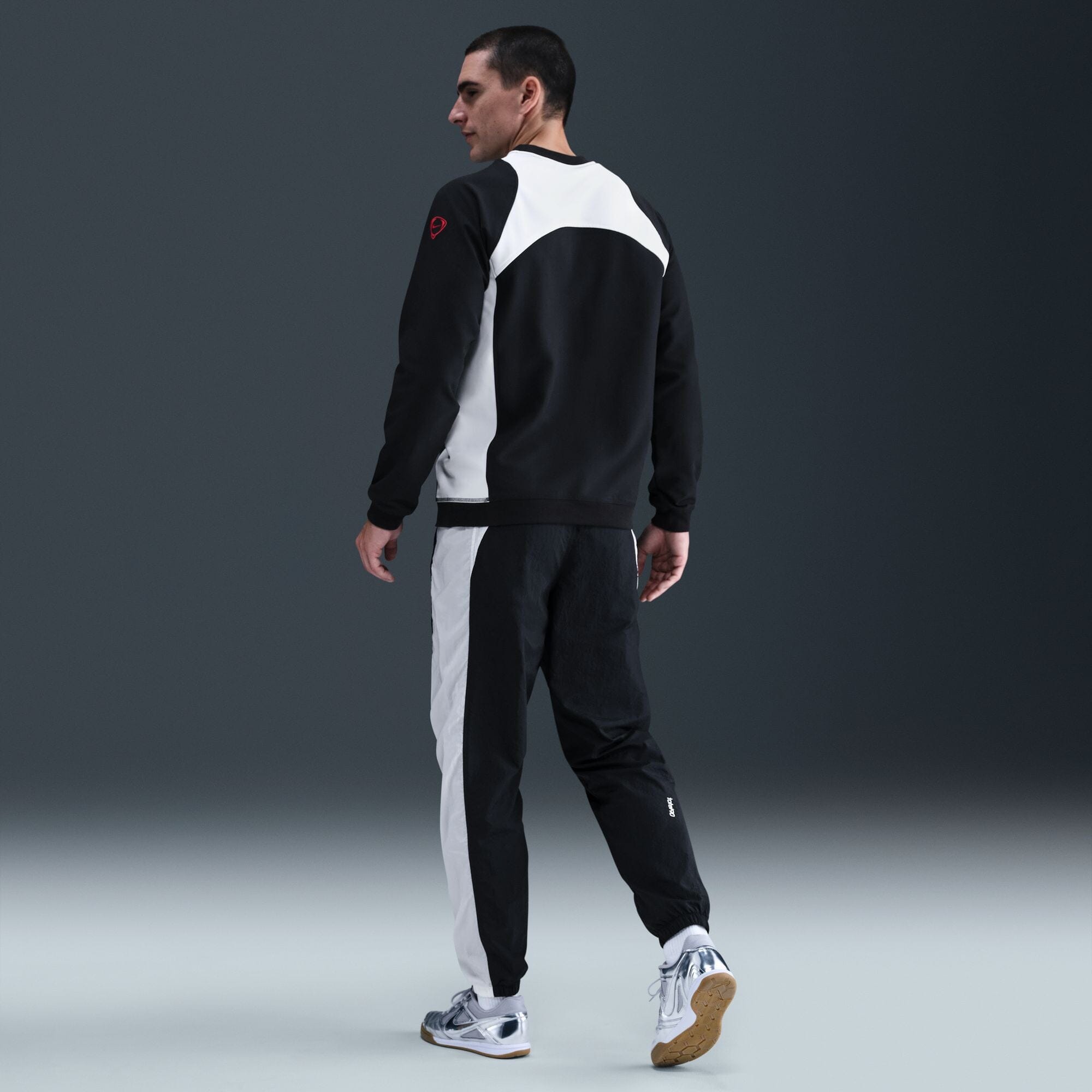 Paris Saint-Germain Men's Total 90 Woven Track Pants (HQ9762-010) Apparel Nike
