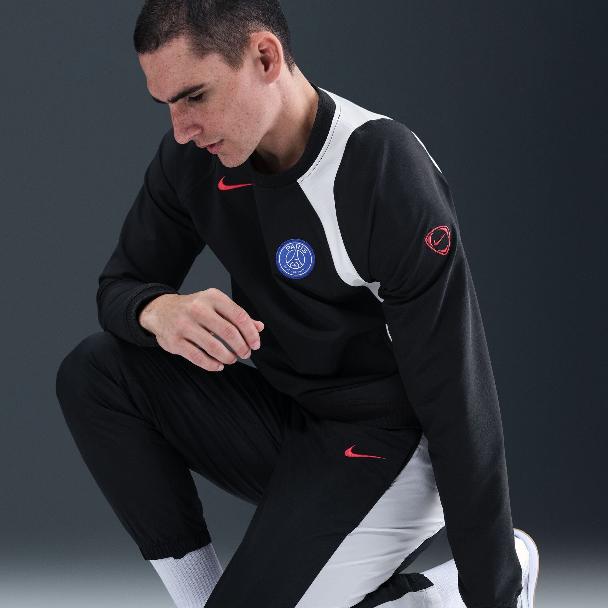 Paris Saint-Germain Men's Total 90 Woven Track Pants (HQ9762-010) Apparel Nike