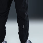 Paris Saint-Germain Men's Total 90 Woven Track Pants (HQ9762-010) Apparel Nike